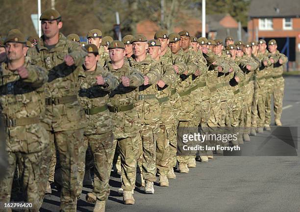 Soldiers from Headquarters Company 1st Battalion The Scots Guards return to their base at Bourlon Barracks and are reunited with their families...