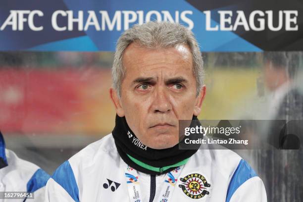 Kashiwa Reysol team coach Nelsinho looks on during the AFC Champions League match between Guizhou Renhe and Kashiwa Reysol on February 27, 2013 in...