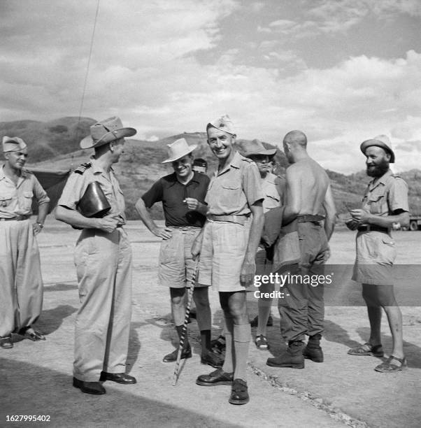 French Former majors in Indochina Brigadier general Paul Arnault and commandant Lambert meet French Union soldiers, in September 1950, Cao Bang....