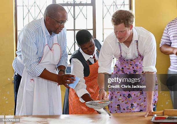 Prince Harry and Prince Seeiso of Lesotho cook cakes as they visit Kananelo Centre for the deaf, a project supported by his charity Sentebale on...