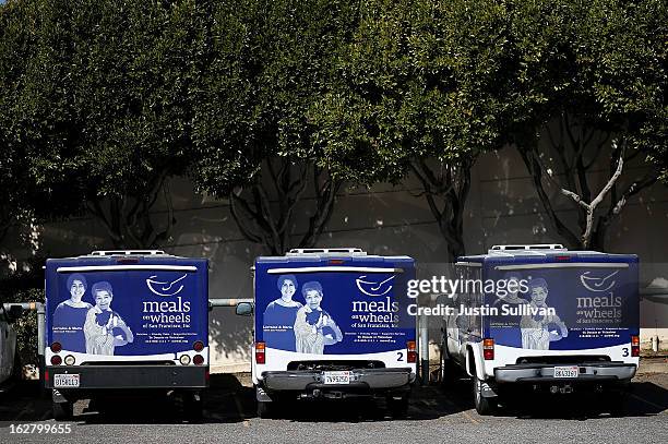 Meals On Wheels of San Francisco trucks sit idle on February 27, 2013 in San Francisco, California. Programs for the poor like Meals On Wheels, which...