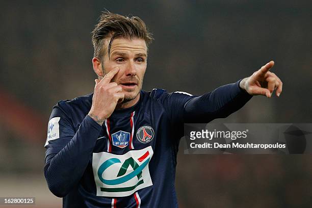 David Beckham of PSG signals to a team mate during the French Cup match between Paris Saint-Germain FC and Marseille Olympic OM at Parc des Princes...
