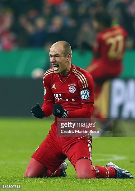Arjen Robben of Muenchen celebrates after the DFB cup quarter final match between Bayern Muenchen and Borussia Dortmund at Allianz Arena on February...