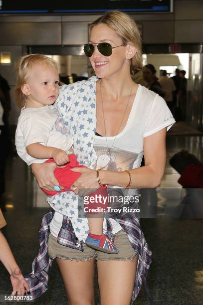 Kate Hudson and her son Bingham Hawn Bellamy are sighted at Miami International Airport on February 27, 2013 in Miami, Florida.