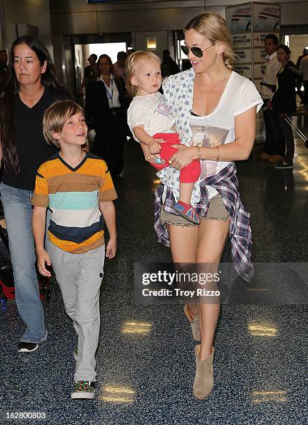 Kate Hudson, and her sons, Bingham Hawn Bellamy and Ryder Robinson are sighted at Miami International Airport on February 27, 2013 in Miami, Florida.