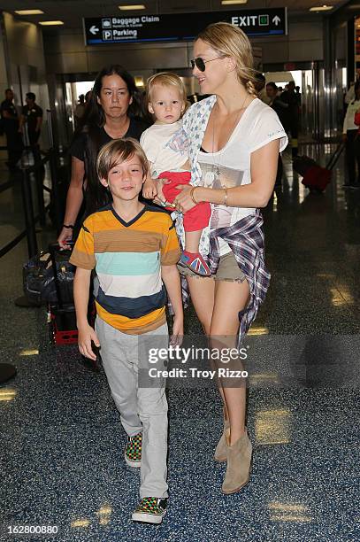 Kate Hudson, and her sons, Bingham Hawn Bellamy and Ryder Robinson are sighted at Miami International Airport on February 27, 2013 in Miami, Florida.