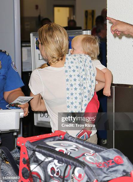 Kate Hudson and her son Bingham Hawn Bellamy are sighted at Miami International Airport on February 27, 2013 in Miami, Florida.