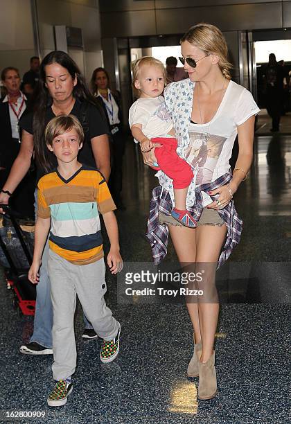 Kate Hudson, and her sons, Bingham Hawn Bellamy and Ryder Robinson are sighted at Miami International Airport on February 27, 2013 in Miami, Florida.