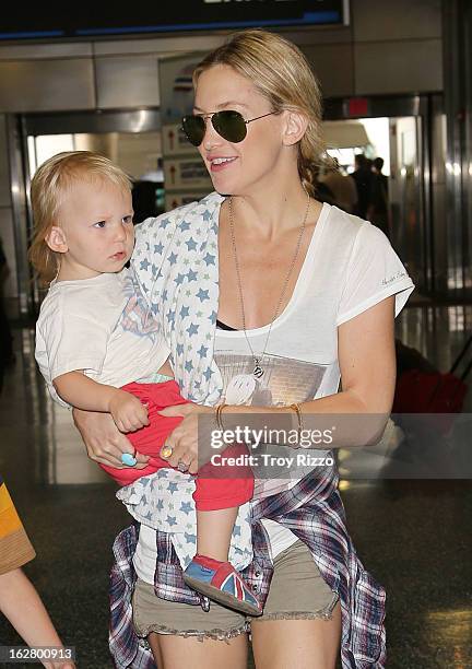 Kate Hudson and her son Bingham Hawn Bellamy are sighted at Miami International Airport on February 27, 2013 in Miami, Florida.