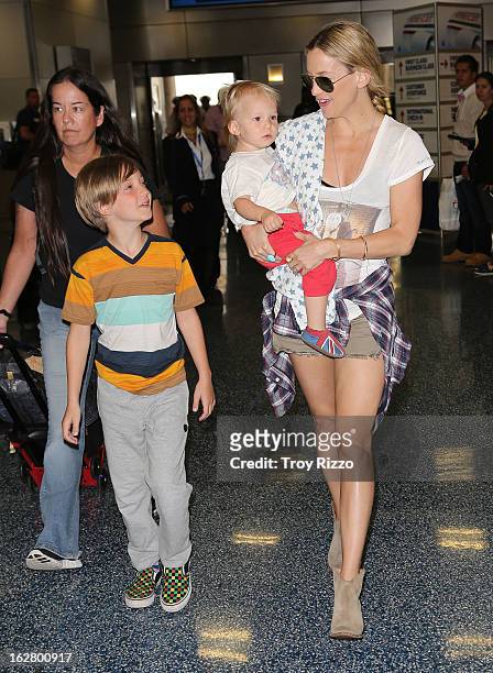 Kate Hudson, and her sons, Bingham Hawn Bellamy and Ryder Robinson are sighted at Miami International Airport on February 27, 2013 in Miami, Florida.