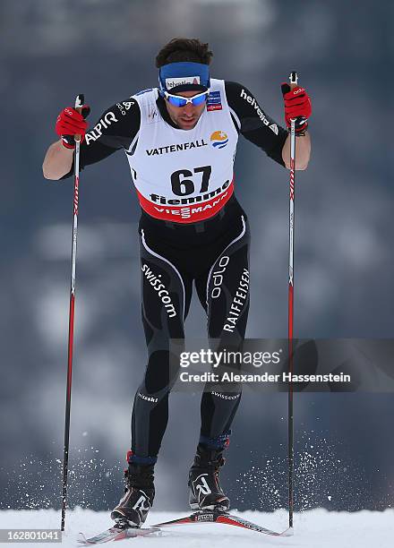 Curdin Perl of Switzerland in action during the Men's Cross Country Individual 15km at the FIS Nordic World Ski Championships on February 27, 2013 in...