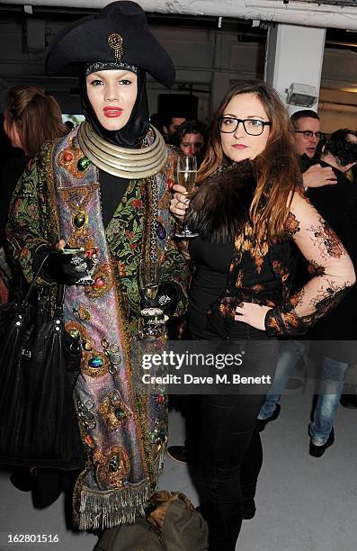 Daniel Lismore and guest attend the launch of artist Dinos Chapman's first album 'Luftbobler' at The Vinyl Factory on February 27, 2013 in London,...