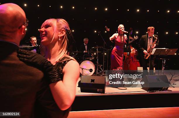 Guests dance at the grand opening of the Waldorf Astoria Berlin hotel on February 27, 2013 in Berlin, Germany.