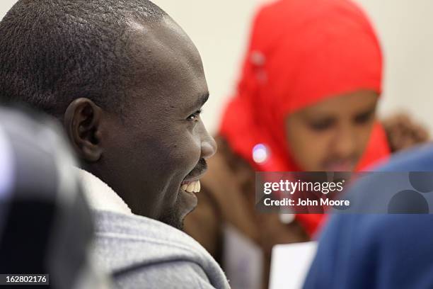 Refugees learns employment skills from volunteers during a job readiness class held at the International Rescue Committee , center on February 27,...
