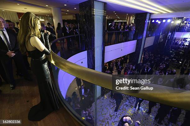 Singer Elisa Schmidt performs at the grand opening of the Waldorf Astoria Berlin hotel on February 27, 2013 in Berlin, Germany.