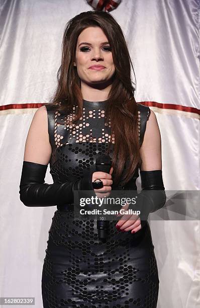 Singer Elisa Schmidt performs at the grand opening of the Waldorf Astoria Berlin hotel on February 27, 2013 in Berlin, Germany.