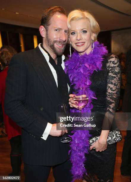 Eva Habermann and Michael Simon attend the grand opening of the Waldorf Astoria Berlin hotel on February 27, 2013 in Berlin, Germany.