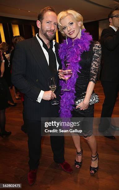 Eva Habermann and Michael Simon attend the grand opening of the Waldorf Astoria Berlin hotel on February 27, 2013 in Berlin, Germany.