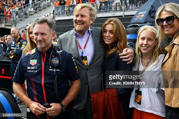 Red Bull Racing's British team principal Christian Horner poses with Dutch King Willem-Alexander , Princess Alexia and Dutch Queen Maxima prior to...