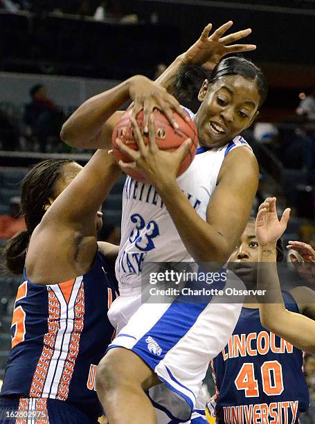 Fayetteville State's Tierra Coleman gains control of the ball against Lincoln University's Mfon Ekanem, left, in CIAA Tournament action on Wednesday,...