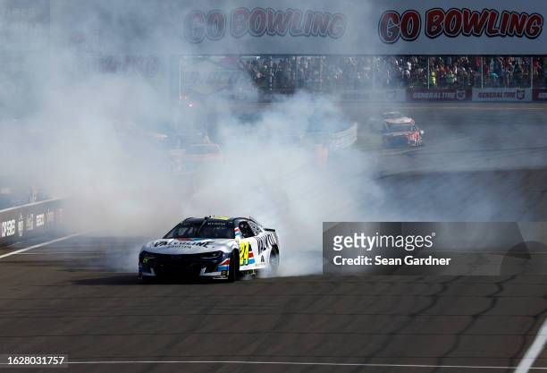 William Byron, driver of the Valvoline Chevrolet, celebrates with a burnout after winning the NASCAR Cup Series Go Bowling at The Glen at Watkins...