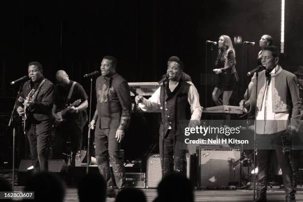 Tito Jackson, Jackie Jackson, Marlon Jackson and Jermaine Jackson of The Jacksons perform on stage in concert at Manchester Apollo on February 27,...