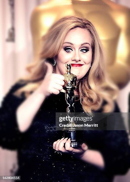 Singer Adele, winner of the Best Original Song award for 'Skyfall,' poses in the press room during the Oscars held at Loews Hollywood Hotel on...