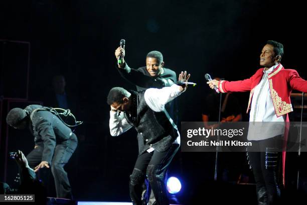 Tito Jackson, Jackie Jackson, Marlon Jackson and Jermaine Jackson of the Jacksons perform on stage in concert at Manchester Apollo on February 27,...