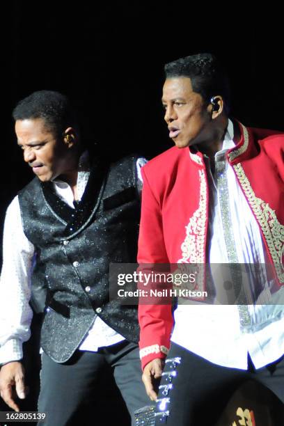 Marlon Jackson and Jackie Jackson of the Jacksons perform on stage in concert at Manchester Apollo on February 27, 2013 in Manchester, England.