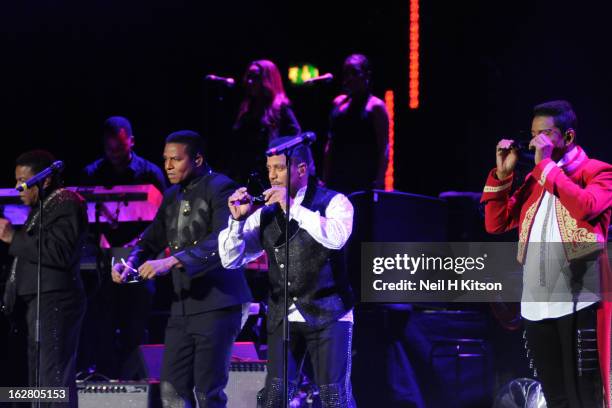 Tito Jackson, Jackie Jackson, Marlon Jackson and Jermaine Jackson of the Jacksons perform on stage in concert at Manchester Apollo on February 27,...