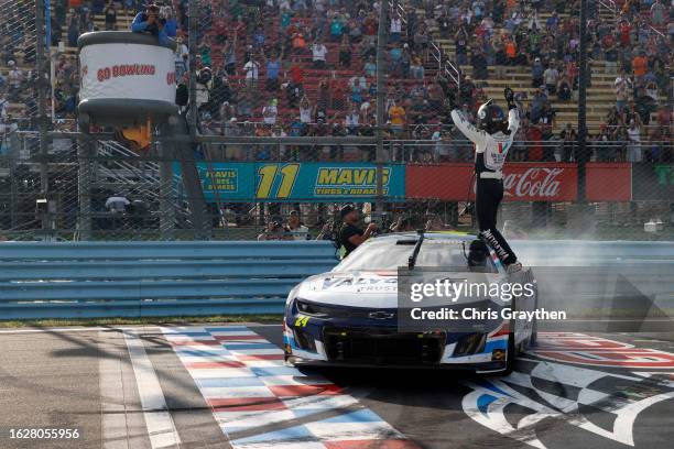 William Byron, driver of the Valvoline Chevrolet, celebrates after winning the NASCAR Cup Series Go Bowling at The Glen at Watkins Glen International...