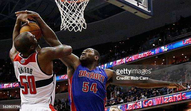 Jason Maxiell of the Detroit Pistons blocks a shot by Emeka Okafor of the Washington Wizards during the second half at Verizon Center on February 27,...