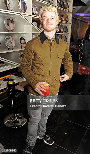 Alfie Allen parties in Wyld at W London Leicester Square after the NME Awards whilst drinking 'CIROC 'n' Roll' cocktails on February 27, 2013 in...