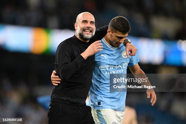 Manchester City manager Pep Guardiola celebrates with Rodri after the Premier League match between Manchester City and Newcastle United at Etihad...