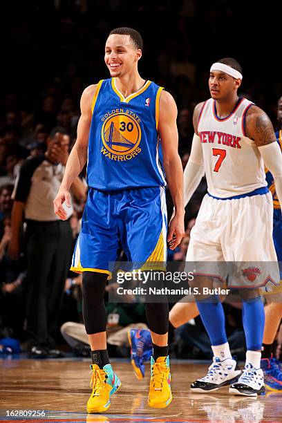 Stephen Curry of the Golden State Warriors smiles during a game against the New York Knicks in which he scored a career high 54 points on February...