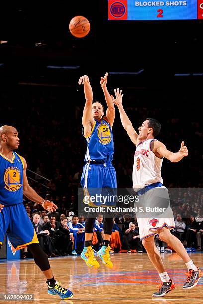 Stephen Curry of the Golden State Warriors shoots a three-pointer against Pablo Prigioni of the New York Knicks on February 27, 2013 at Madison...