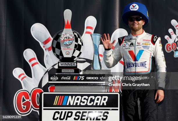 William Byron, driver of the Valvoline Chevrolet, celebrates in victory lane after winning the NASCAR Cup Series Go Bowling at The Glen at Watkins...