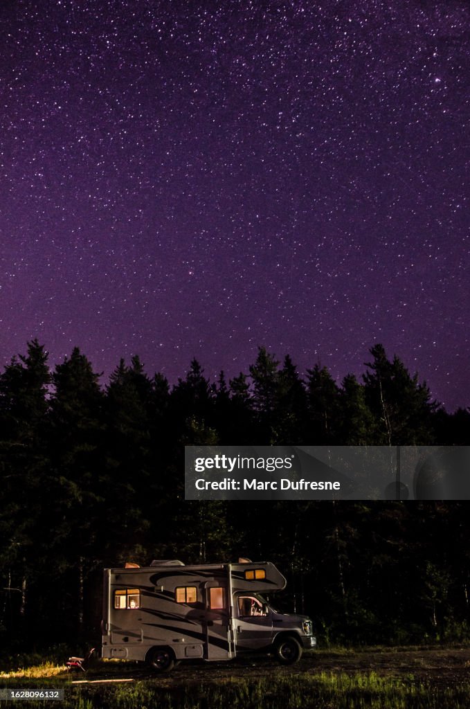 Motor home and night sky