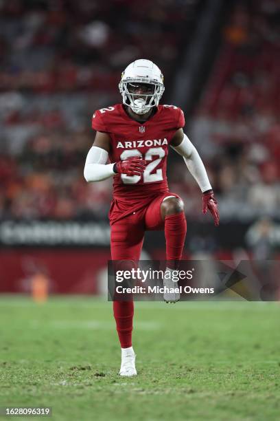 Marlon Mack of the Arizona Cardinals stays warm in between plays during an NFL preseason football game between the Arizona Cardinals and the Kansas...