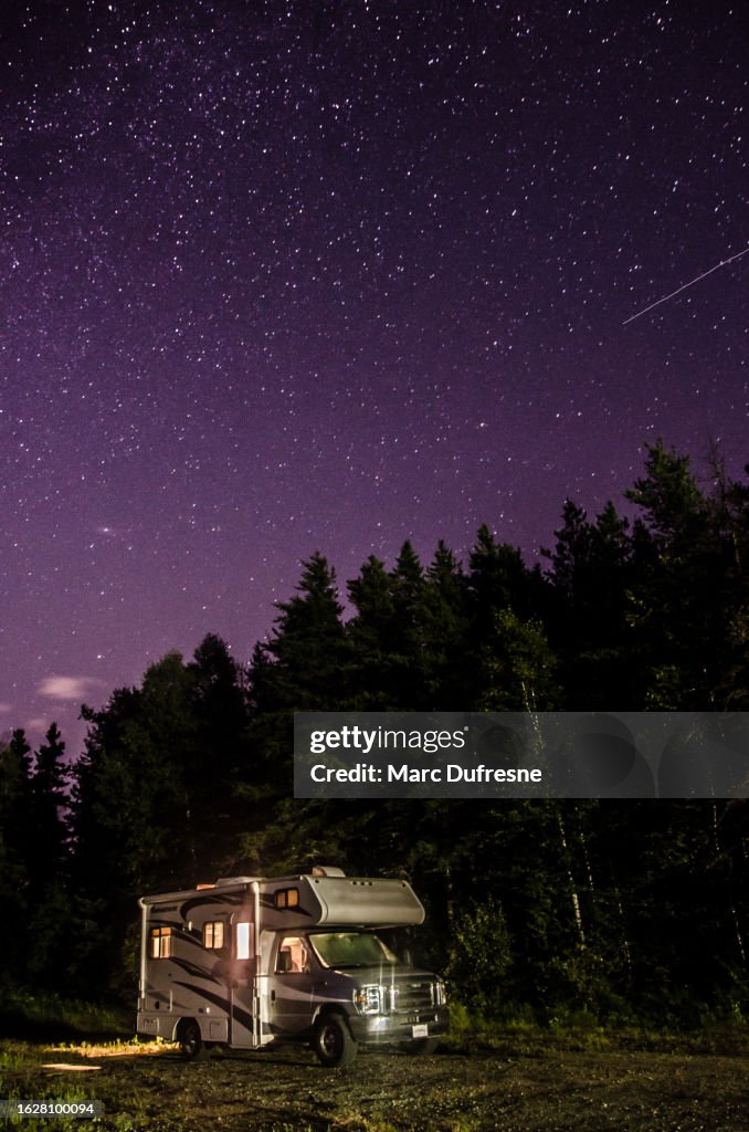 Motor home and night sky