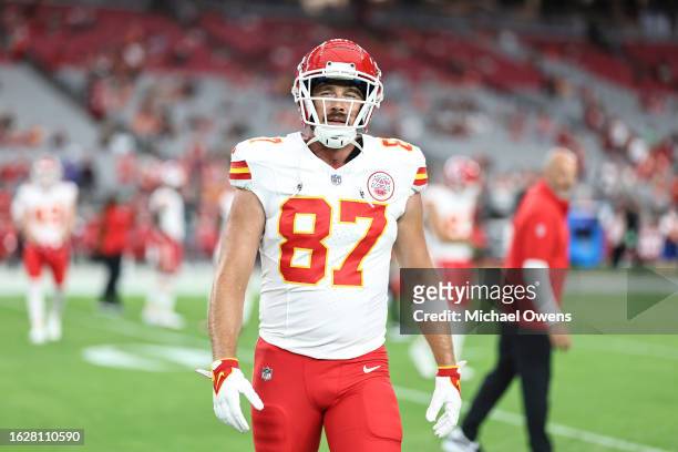 Travis Kelce of the Kansas City Chiefs reacts as he warms up prior to an NFL preseason football game between the Arizona Cardinals and the Kansas...