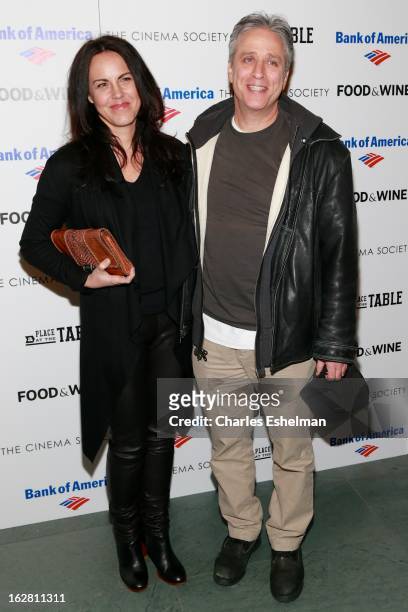 Tracey McShane and husband Jon Stewart arrives at Bank of America and Food & Wine with The Cinema Society present a screening of "A Place at the...