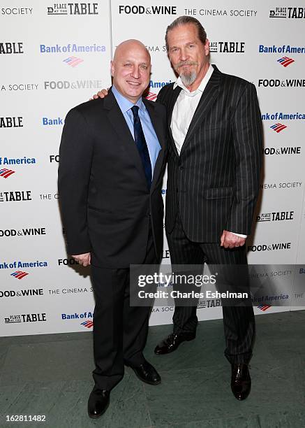 Chef Tom Colicchio and actor Jeff Bridges arrive at Bank of America and Food & Wine with The Cinema Society present a screening of "A Place at the...