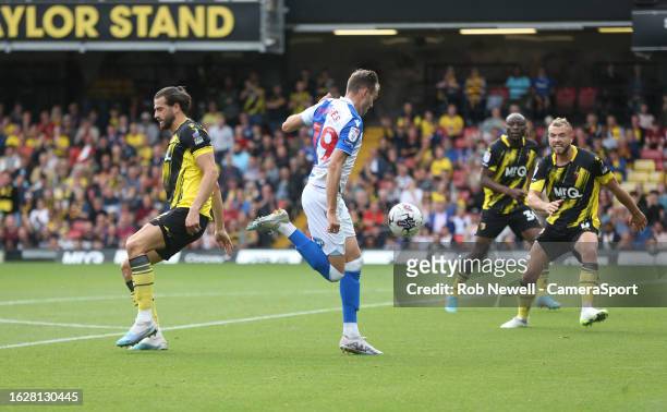 Blackburn Rovers' Ryan Hedges skips past Watford's Wesley Hoedt before scoring his side's first goal during the Sky Bet Championship match between...