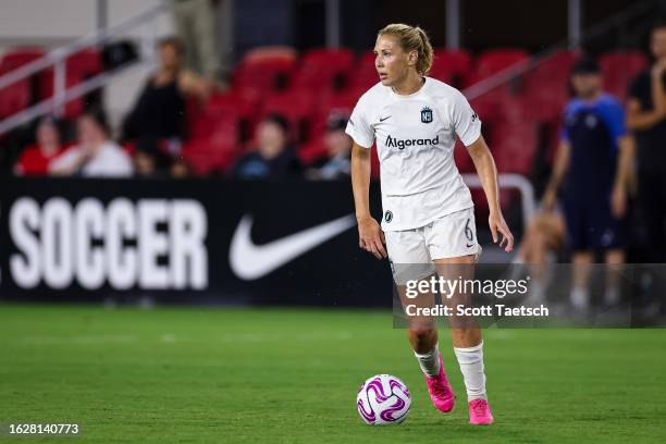 Allie Long of NJ/NY Gotham FC kicks the ball against the Washington Spirit during the second half of the NWSL game at Audi Field on July 28, 2023 in...