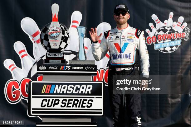 William Byron, driver of the Valvoline Chevrolet, celebrates in victory lane after winning the NASCAR Cup Series Go Bowling at The Glen at Watkins...