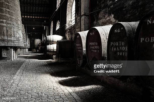 old porto wine cellar - portugal wine stock pictures, royalty-free photos & images