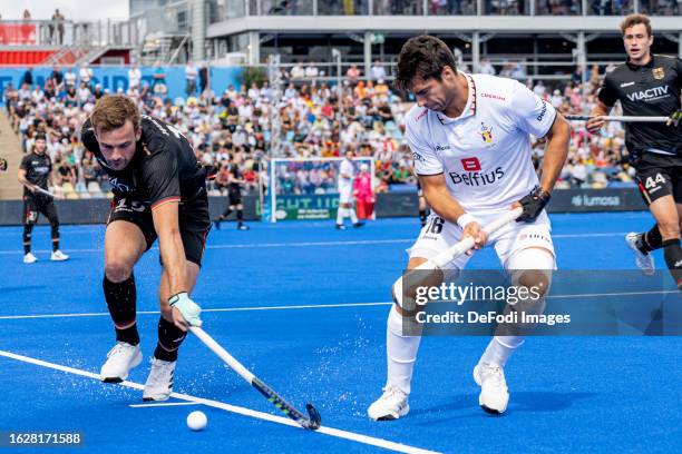 Alexander Hendrickx of Belgium and Justus Weigand of Germany battle for the ball during the 2023 Men's EuroHockey Championship - 3rd place match...