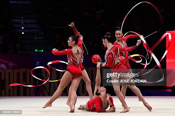 Spain's gymnasts compete in the group 5 hoops final of the Olympic qualifier 40th FIG Rhythmic Gymnastics World Championships in Valencia on August...