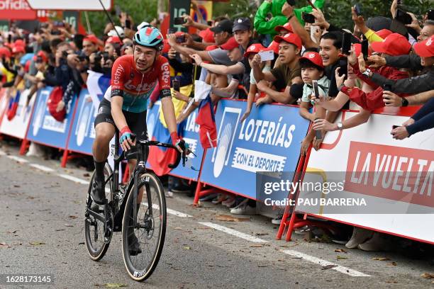 Team Lotto's Danish rider Andreas Lorentz Kron crosses the finish line in first place during the second stage of the 2023 La Vuelta cycling tour of...